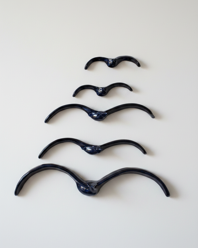Ceramic Flying Black Gulls