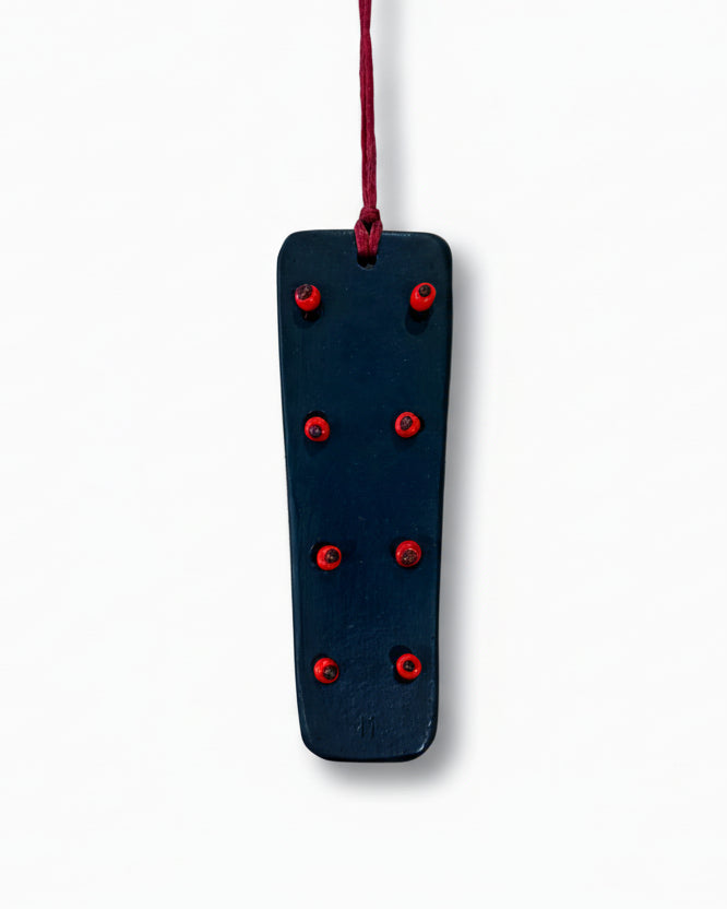 Amulet with Red Beads in Bronze