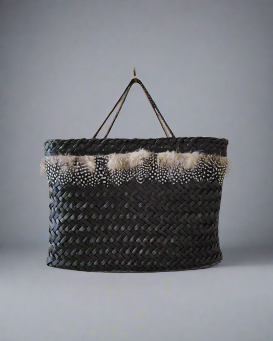 Kete Brown with Spotted Feathers