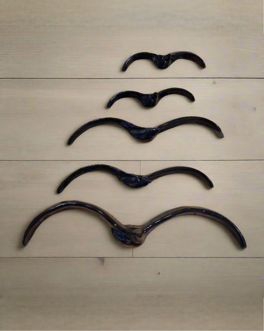Ceramic Flying Black Gulls