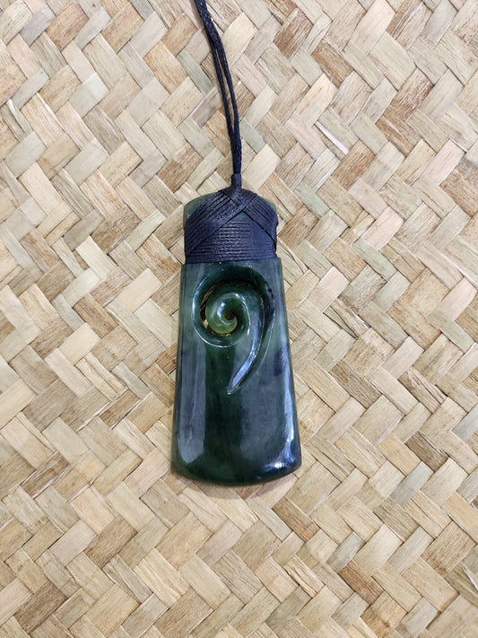 Toki Carved Koru Pendant