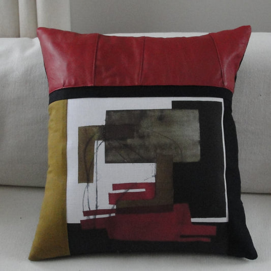 Mustard and red leather cushion