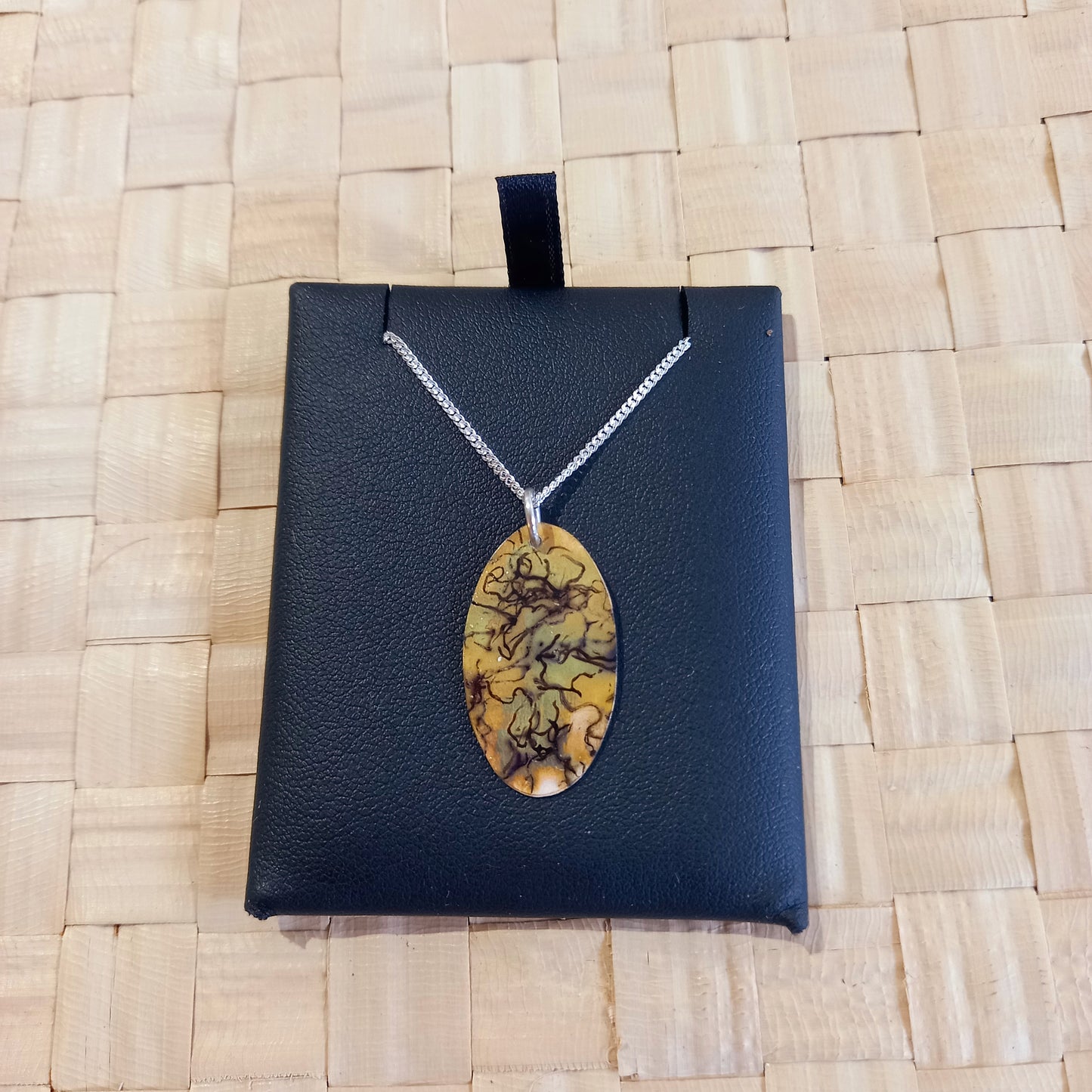 Distraction Gold Oval Pendant